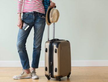 USA, New Jersey, Woman ready to go on vacations